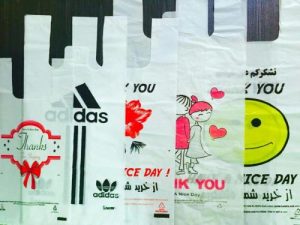 كيس بلاستيكي بمقبض ركاب